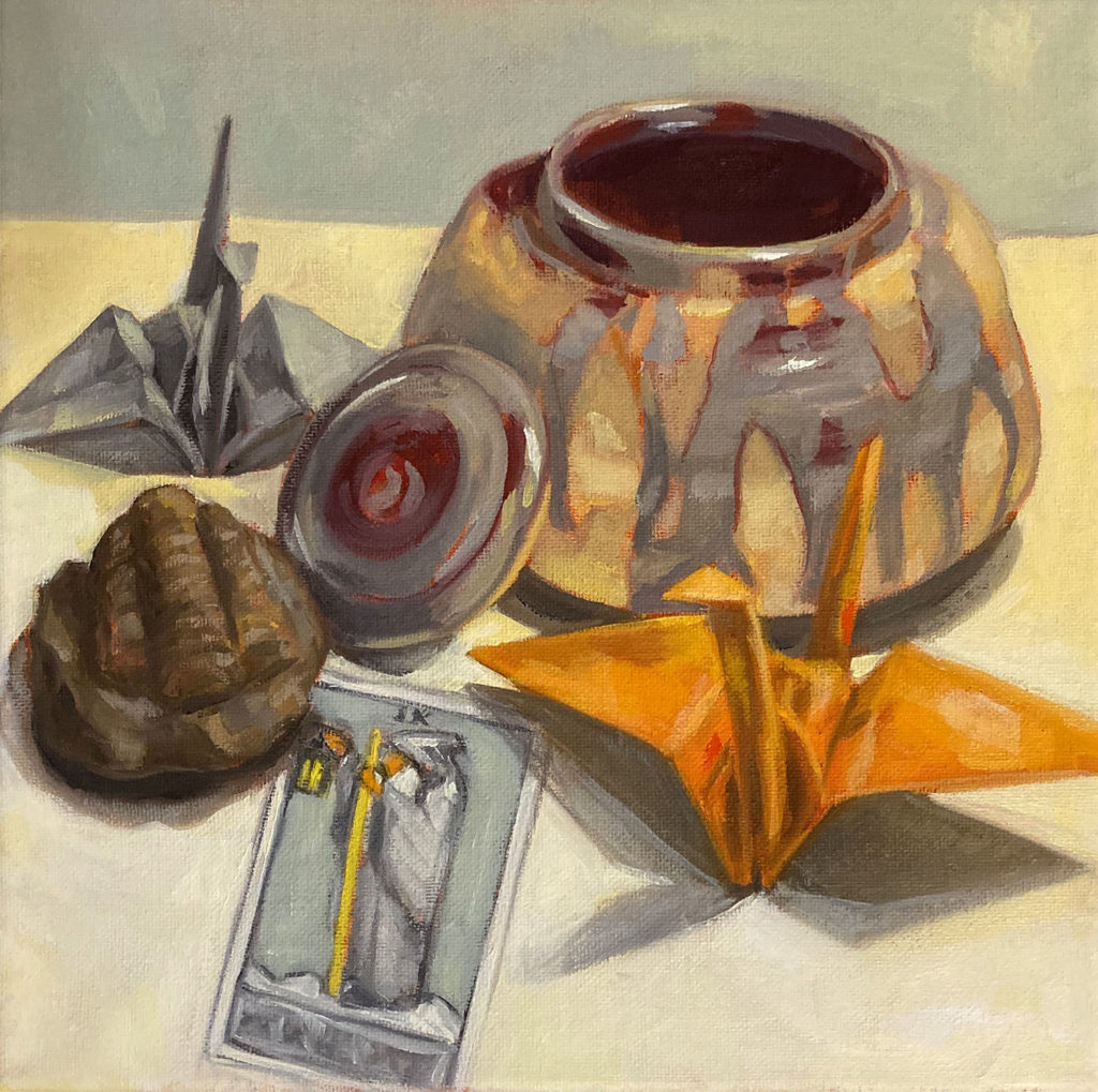 Painting of the Hermit tarot card, paper cranes and pottery jar.