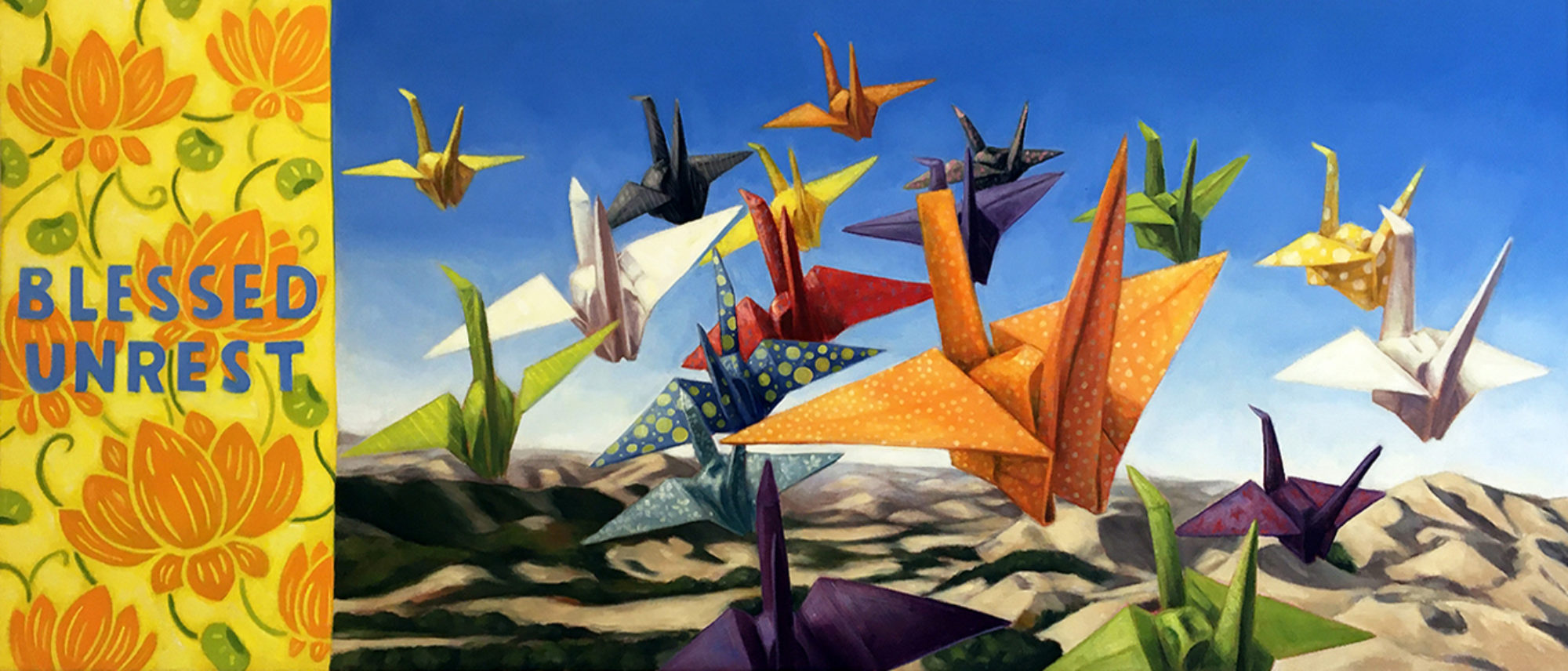 Painting of many multi-colored paper cranes flying above a mountainous landscape. The words " Blessed Unrest" painting on the left hand side over a pattern of orange flowers on a yellow background.